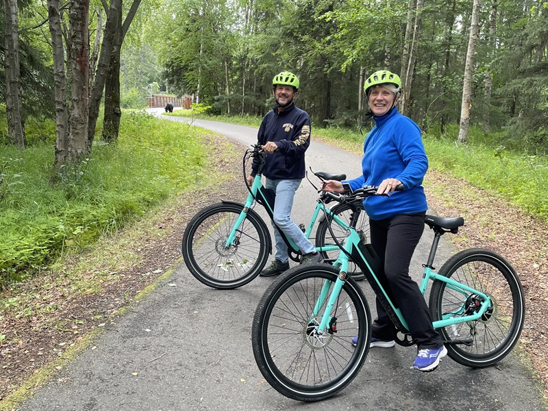 Couple riding on trail